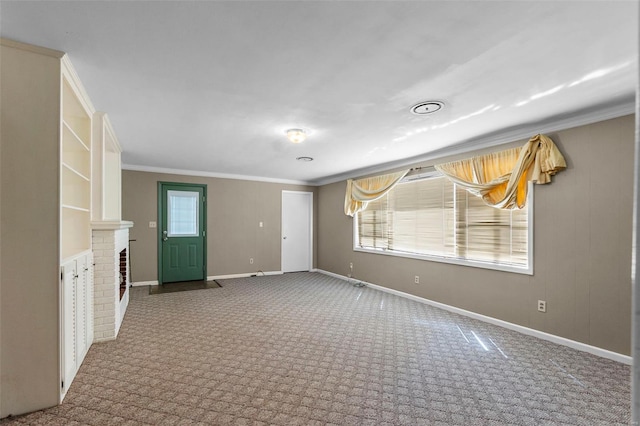 605 W Washington St, Kennett, MO 63857 - unfurnished living room with carpet, baseboards, and ornamental molding