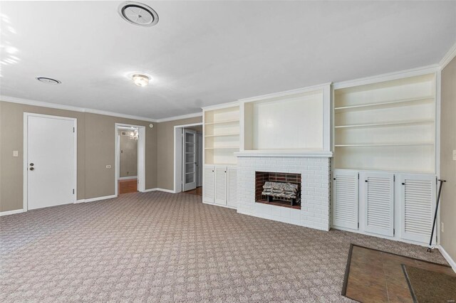 605 W Washington St, Kennett, MO 63857 - unfurnished living room with a brick fireplace, carpet flooring, baseboards, and ornamental molding