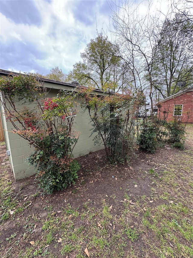 605 W Washington St, Kennett, MO 63857 - view of property exterior with concrete block siding