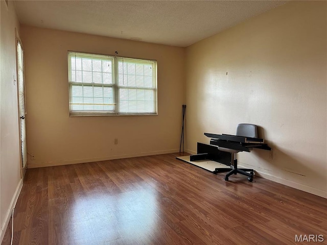 8736 Santa Bella Dr Unit G, Hazelwood, MO 63042 - office with wood finished floors and baseboards