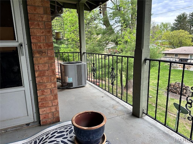 8736 Santa Bella Dr Unit G, Hazelwood, MO 63042 - balcony featuring central AC unit