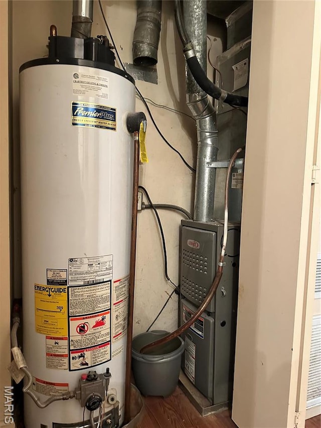 8736 Santa Bella Dr Unit G, Hazelwood, MO 63042 - utility room with gas water heater