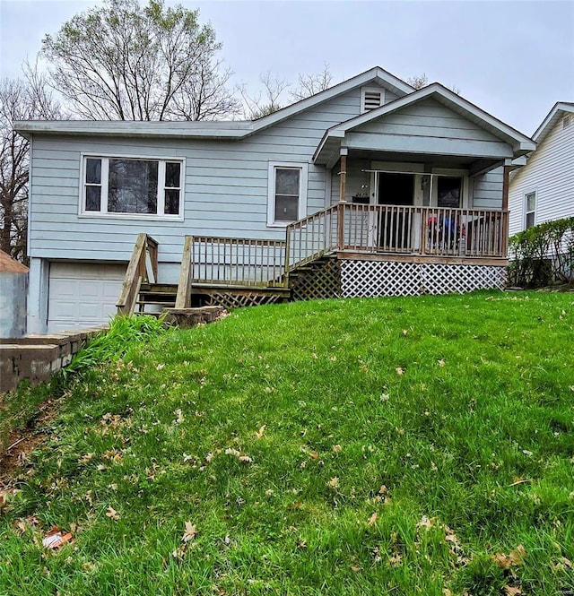 2615 Krum St, Alton, IL 62002 - view of front of property with an attached garage, a front yard, and a porch