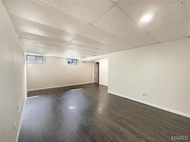 1 Pine Forest Ct, Dardenne Prairie, MO 63368 - below grade area featuring dark wood-style floors, baseboards, and a drop ceiling