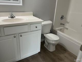 134 Southview Dr, Jackson, MO 63755 - full bathroom with vanity, toilet, wood finished floors, and bathtub / shower combination