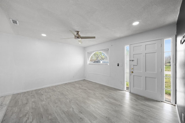 47 E Adams Dr E, St Louis, IL 62206 - entryway featuring a ceiling fan, a textured ceiling, wood finished floors, recessed lighting, and baseboards