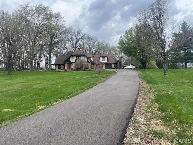 762 Crider Ln, Union, MO 63084 - tudor home featuring a front yard