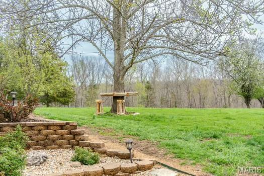 762 Crider Ln, Union, MO 63084 - view of green lawn featuring a view of trees