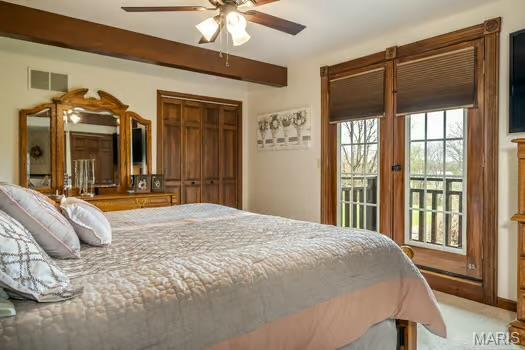 762 Crider Ln, Union, MO 63084 - bedroom with ceiling fan, access to outside, and beam ceiling