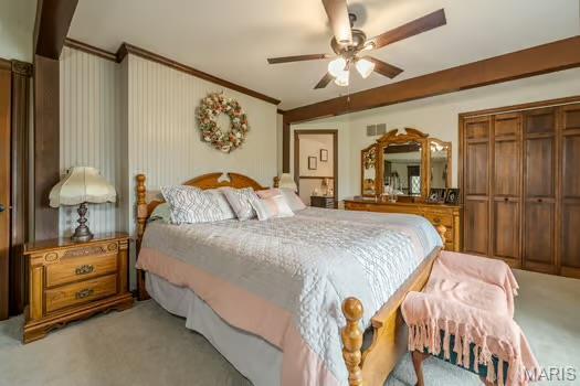 762 Crider Ln, Union, MO 63084 - bedroom featuring light carpet, ceiling fan, a closet, and crown molding