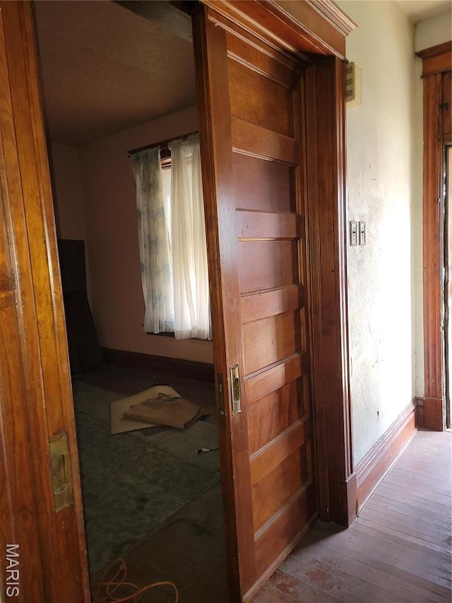 4453 Athlone Ave, Saint Louis, MO 63115 - hall featuring hardwood / wood-style floors and baseboards