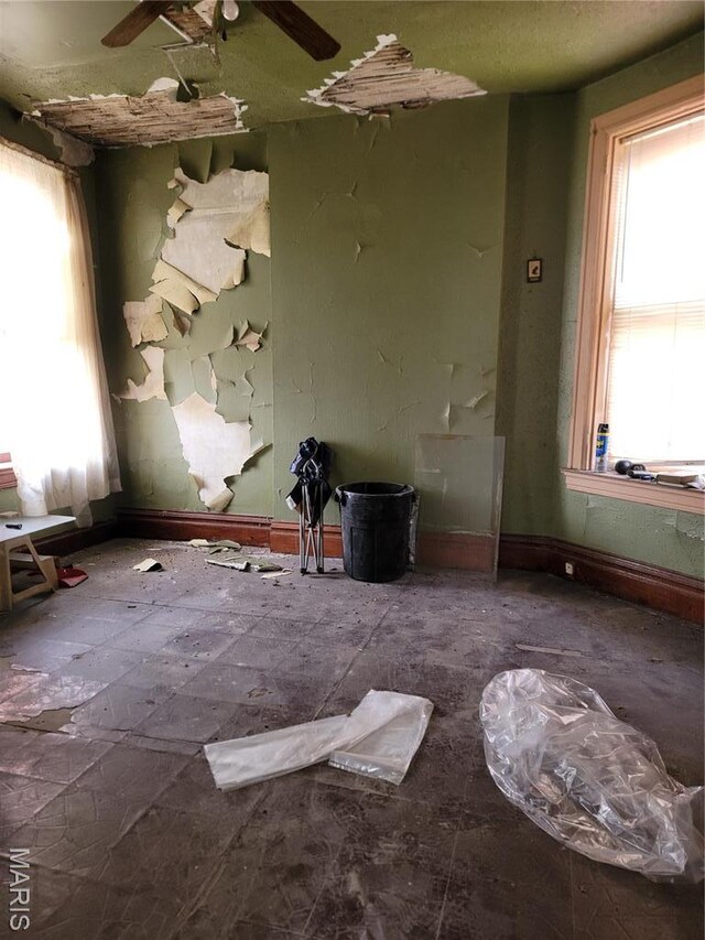4453 Athlone Ave, Saint Louis, MO 63115 - empty room featuring baseboards and ceiling fan