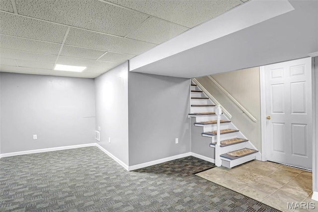 765 Pottery Tower Ln, Washington, MO 63090 - finished below grade area featuring stairs, baseboards, carpet, and a drop ceiling