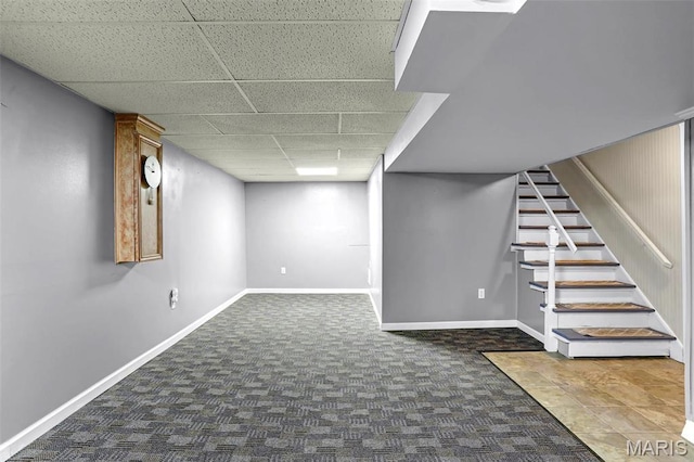 765 Pottery Tower Ln, Washington, MO 63090 - finished below grade area featuring a drop ceiling, carpet flooring, stairs, and baseboards