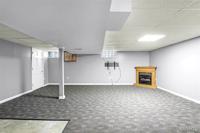765 Pottery Tower Ln, Washington, MO 63090 - basement with carpet, a paneled ceiling, baseboards, and plenty of natural light