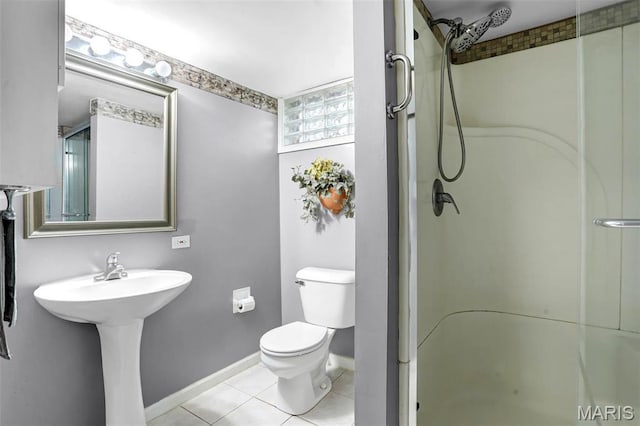 765 Pottery Tower Ln, Washington, MO 63090 - bathroom with a stall shower, tile patterned floors, toilet, and baseboards