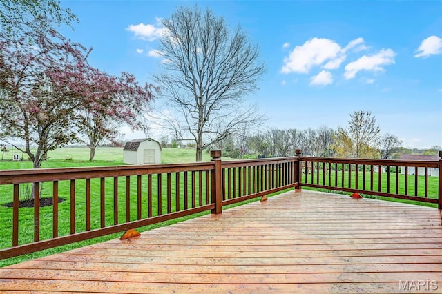 765 Pottery Tower Ln, Washington, MO 63090 - wooden deck featuring a storage unit, an outdoor structure, and a yard