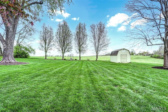 765 Pottery Tower Ln, Washington, MO 63090 - view of green lawn featuring a storage shed and an outbuilding