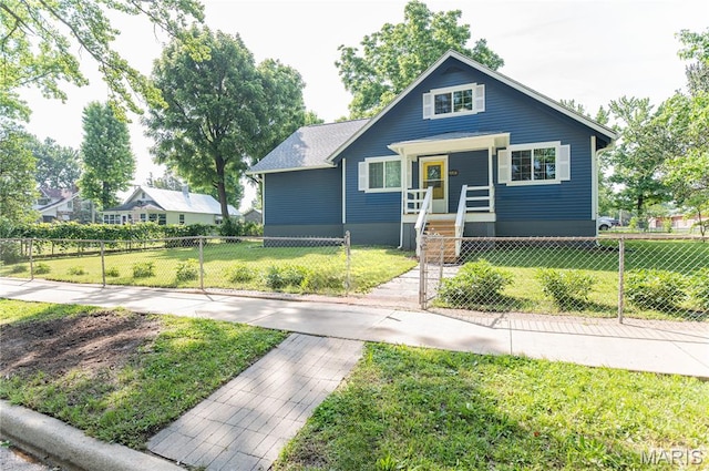 110 W Scioto St, St James, MO 65559 - bungalow-style home featuring a fenced front yard and covered porch