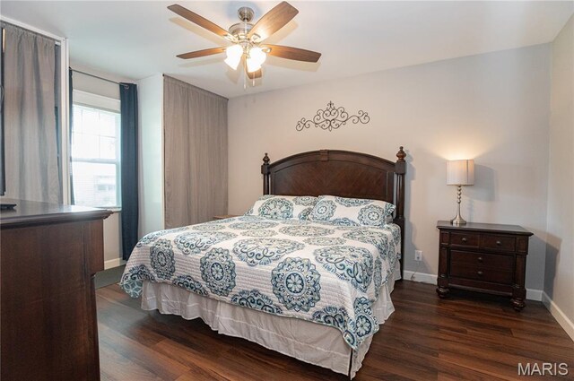 110 W Scioto St, St James, MO 65559 - bedroom with dark wood-type flooring and a ceiling fan