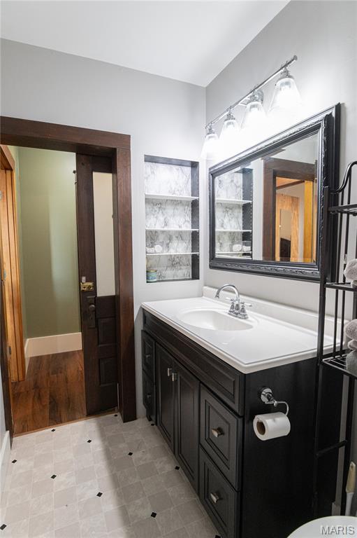 110 W Scioto St, St James, MO 65559 - bathroom with vanity and toilet