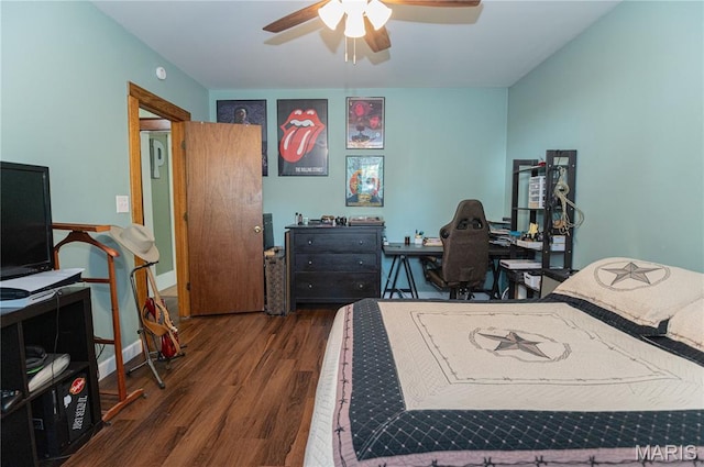 110 W Scioto St, St James, MO 65559 - bedroom featuring wood finished floors, an office area, and ceiling fan