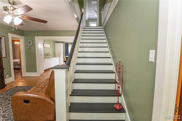 110 W Scioto St, St James, MO 65559 - stairs featuring a ceiling fan and wood finished floors