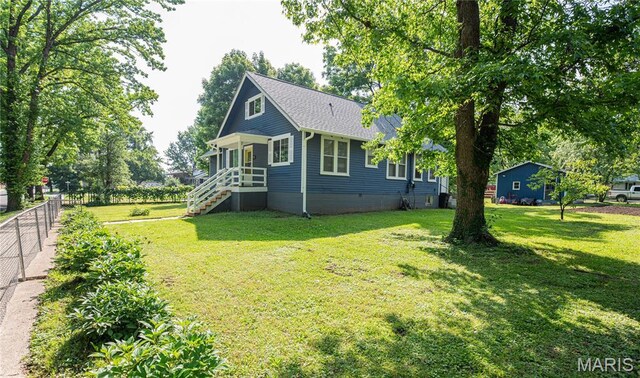 110 W Scioto St, St James, MO 65559 - view of side of property featuring a shingled roof