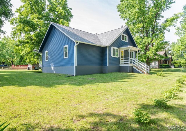 110 W Scioto St, St James, MO 65559 - view of front of house featuring a shingled roof