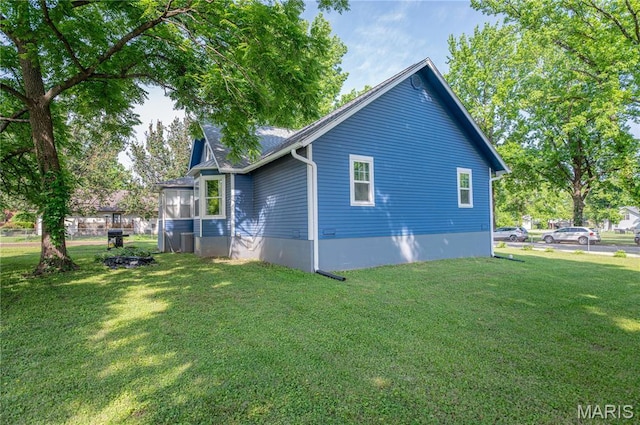 110 W Scioto St, St James, MO 65559 - view of property exterior with a yard