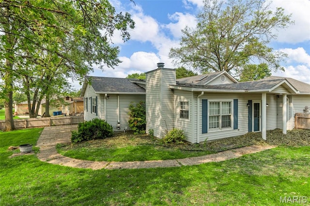 1064 Pinecone Trl, Florissant, MO 63031 - view of side of home with a chimney