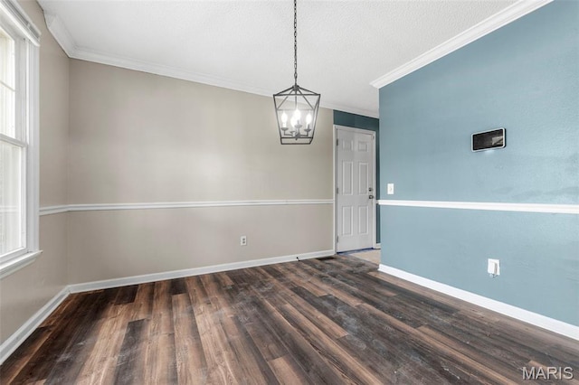 1064 Pinecone Trl, Florissant, MO 63031 - unfurnished dining area featuring wood finished floors, crown molding, a chandelier, baseboards, and a textured ceiling