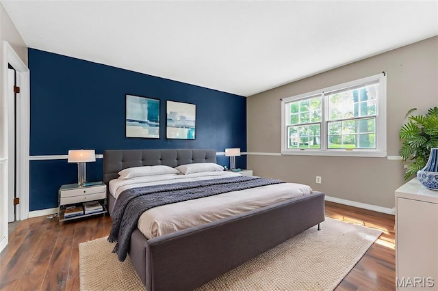 1064 Pinecone Trl, Florissant, MO 63031 - bedroom with wood finished floors and baseboards