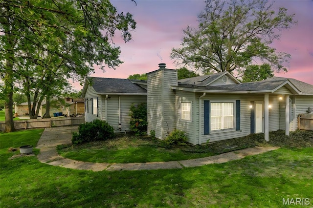 1064 Pinecone Trl, Florissant, MO 63031 - view of property exterior featuring a chimney