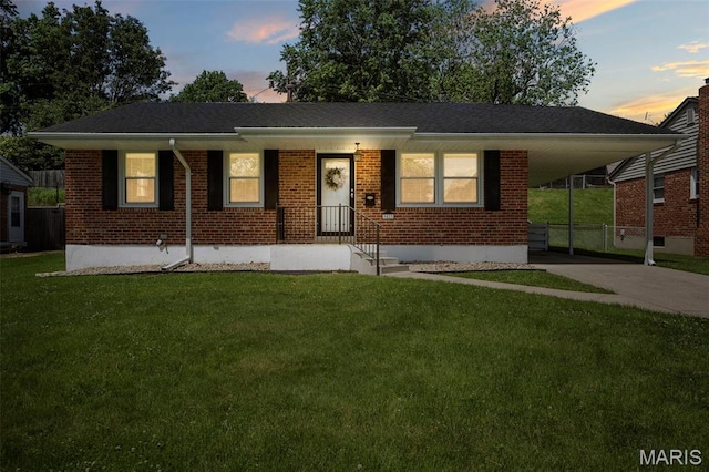9523 Hale Dr, Saint Louis, MO 63123 - view of front of house featuring brick siding, an attached carport, and concrete driveway