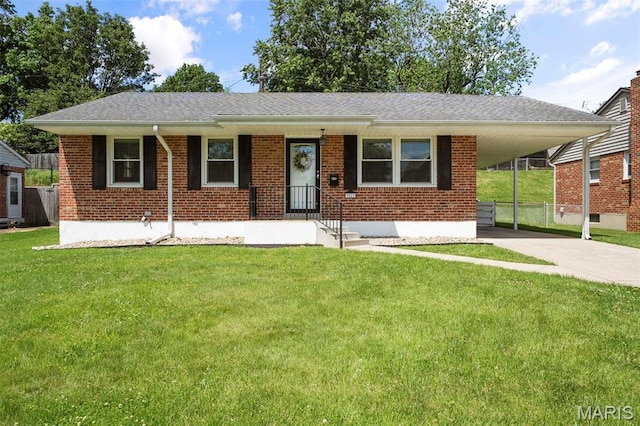 9523 Hale Dr, Saint Louis, MO 63123 - view of front facade featuring driveway, an attached carport, and brick siding