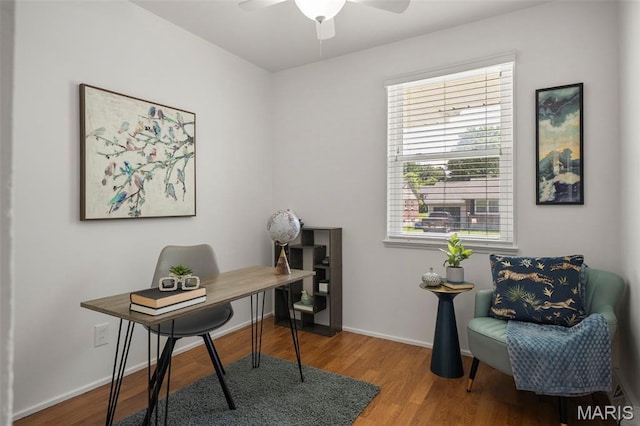 9523 Hale Dr, Saint Louis, MO 63123 - home office featuring a ceiling fan, wood finished floors, baseboards, and healthy amount of natural light