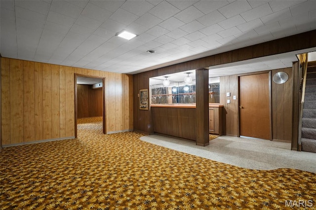 9523 Hale Dr, Saint Louis, MO 63123 - basement with baseboards, stairway, and wooden walls