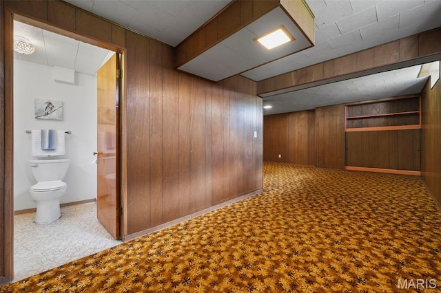 9523 Hale Dr, Saint Louis, MO 63123 - hallway with wood walls and baseboards