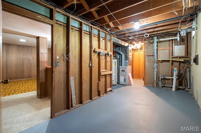 9523 Hale Dr, Saint Louis, MO 63123 - unfinished basement featuring heating unit, gas water heater, and wood walls