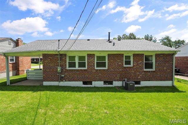 9523 Hale Dr, Saint Louis, MO 63123 - rear view of house with cooling unit, brick siding, and a shingled roof
