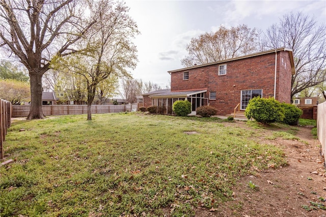 112 Summer Dr, Sikeston, MO 63801 - view of yard featuring a sunroom and entry steps