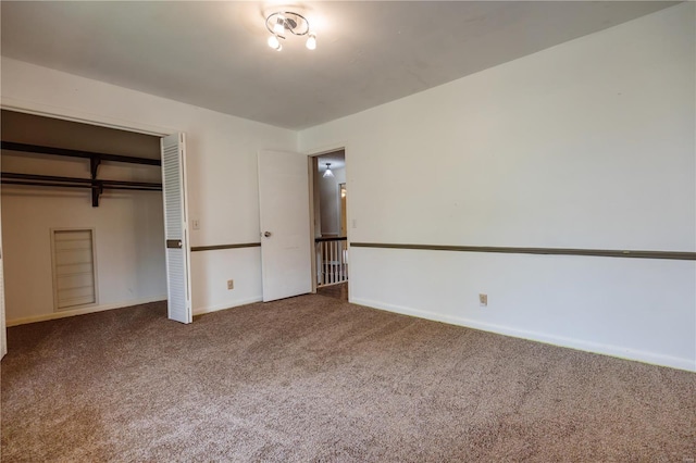 112 Summer Dr, Sikeston, MO 63801 - unfurnished bedroom featuring carpet, a closet, and baseboards