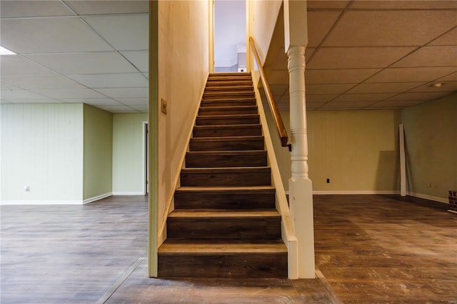 112 Summer Dr, Sikeston, MO 63801 - staircase with a paneled ceiling, wood finished floors, and baseboards