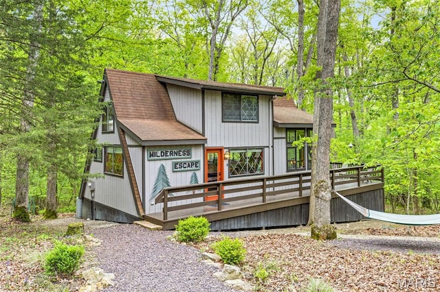 634 Wunderbar Point Dr, Innsbrook, MO 63390 - view of front of property featuring roof with shingles and a deck