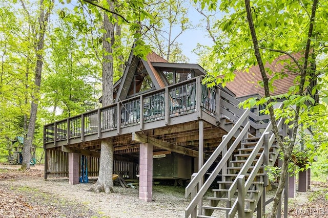 634 Wunderbar Point Dr, Innsbrook, MO 63390 - back of property featuring a deck and stairs