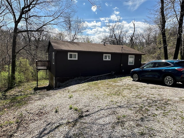 1612 California Ave, Collinsville, IL 62234 - view of property exterior with a wooden deck and a shingled roof