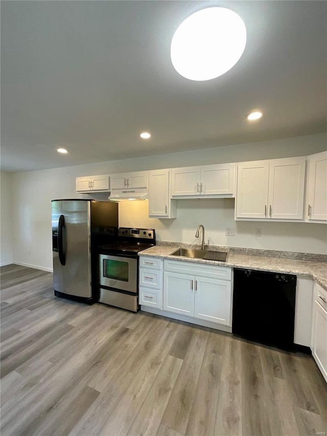 1612 California Ave, Collinsville, IL 62234 - kitchen featuring stainless steel appliances, a sink, white cabinets, light wood-type flooring, and recessed lighting