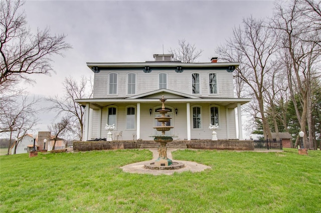 1508 State Route 140, Smithboro, IL 62284 - italianate home featuring a front lawn, covered porch, and a chimney