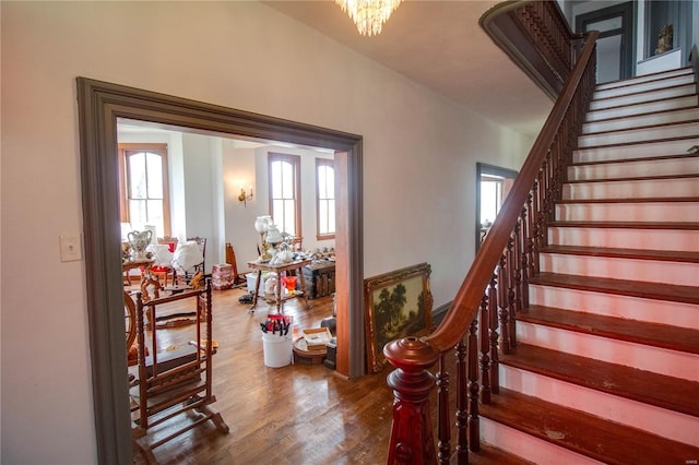 1508 State Route 140, Smithboro, IL 62284 - stairway with wood finished floors, healthy amount of natural light, and a chandelier